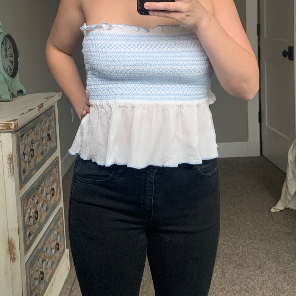 Strapless top with adjustable tie straps in the back